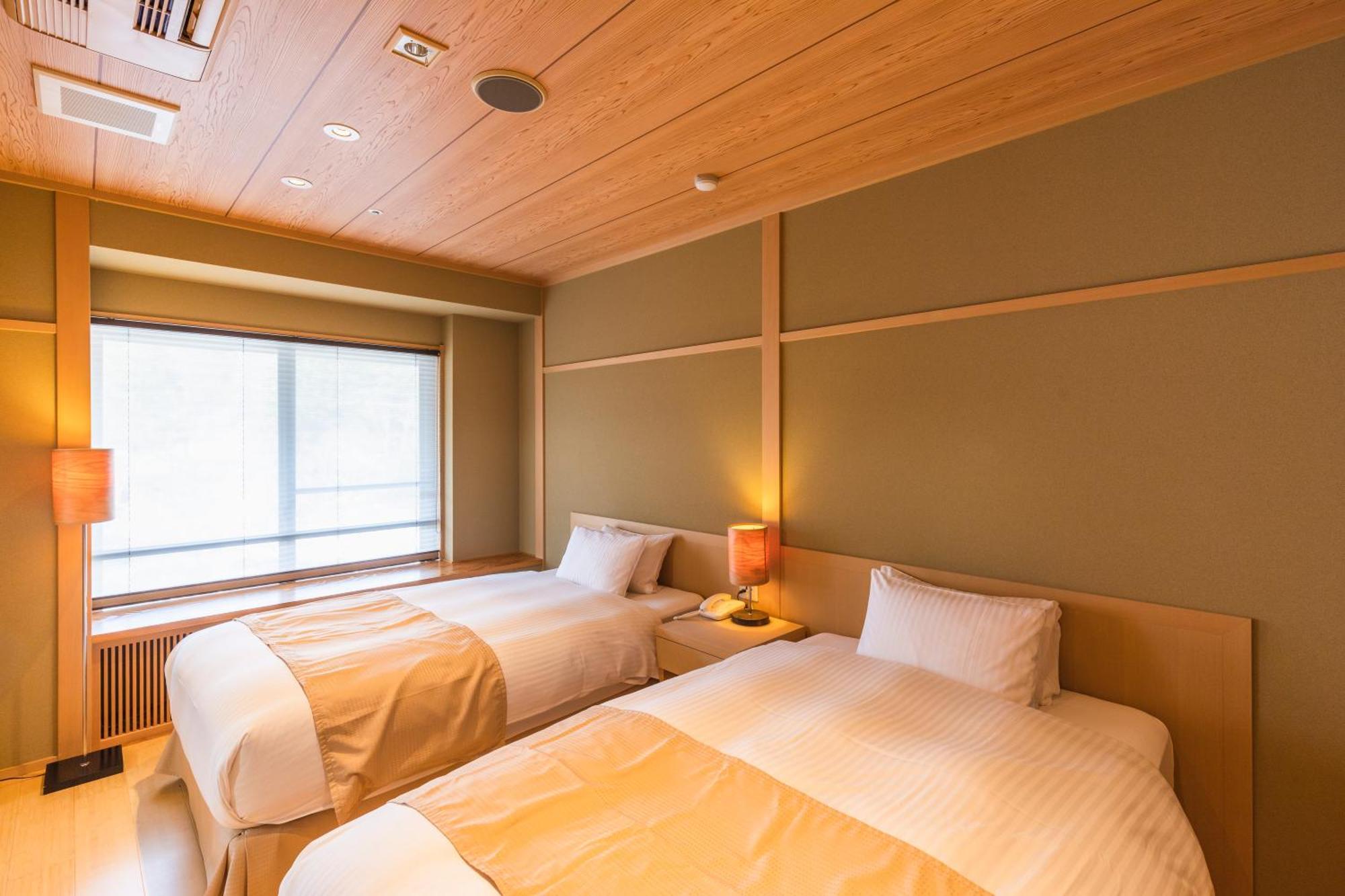 Tsuta Onsen Ryokan Товада Номер фото