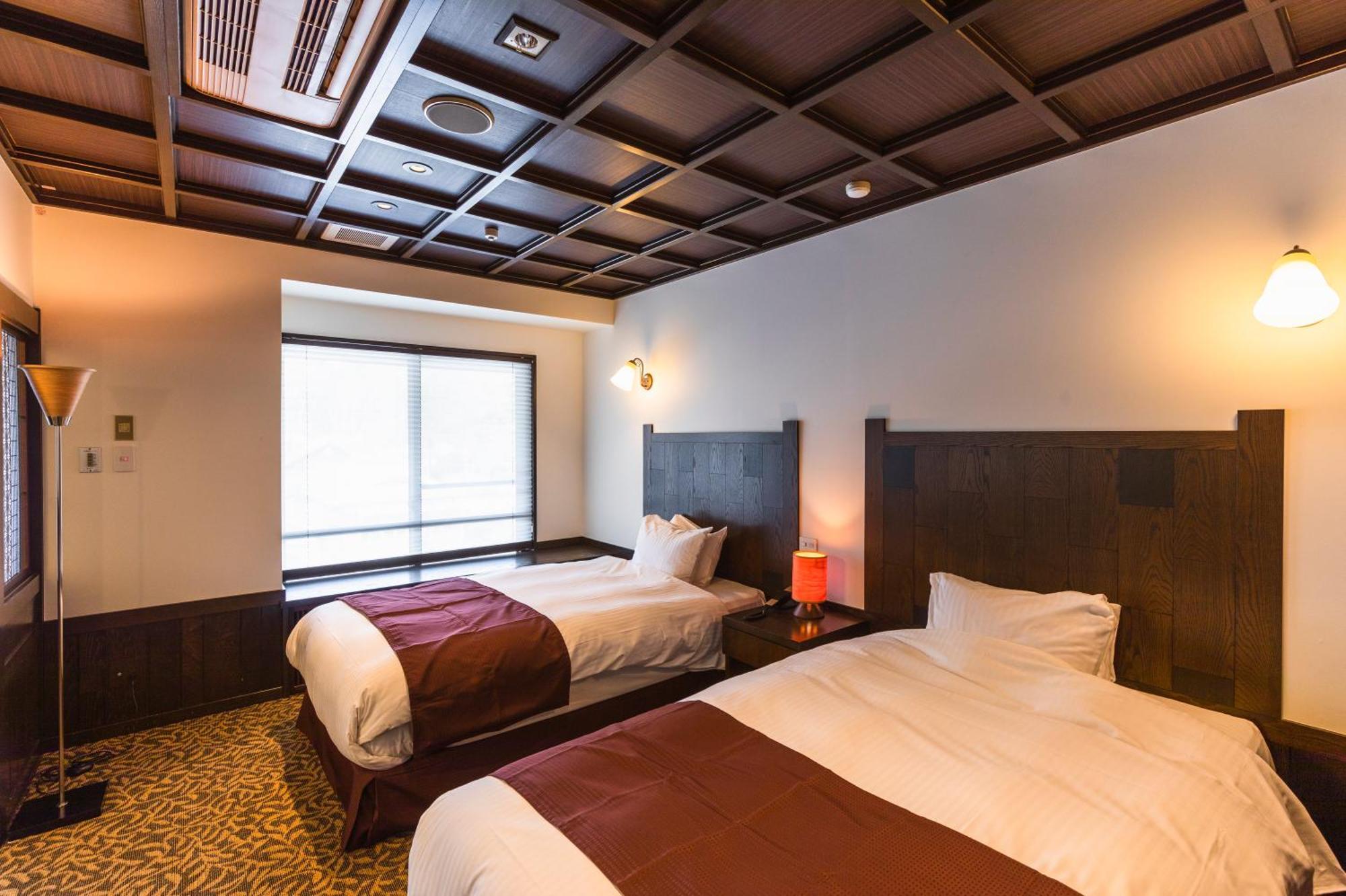 Tsuta Onsen Ryokan Товада Номер фото