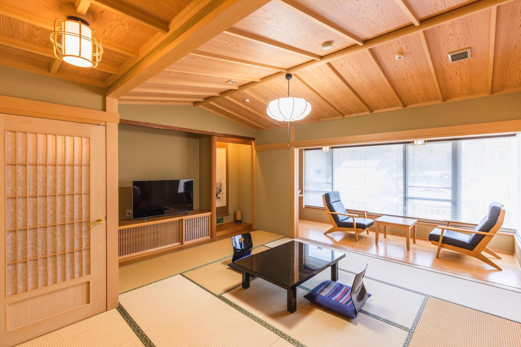 Tsuta Onsen Ryokan Товада Номер фото